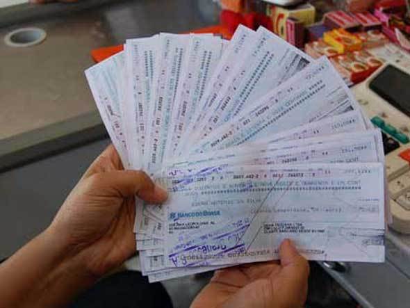 size_590_cheques-sem-fundo