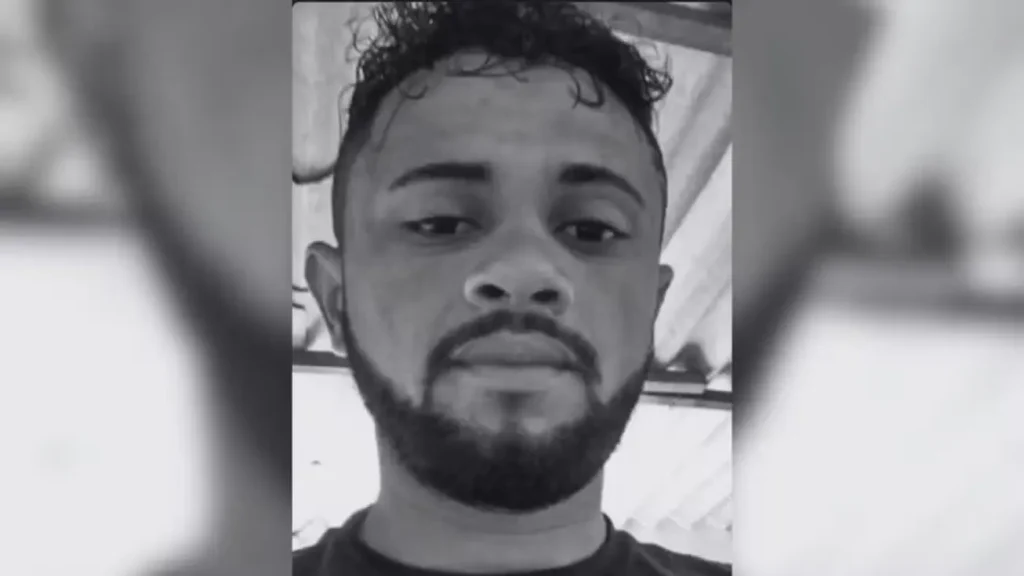 Vigilante de araióses morto em uberlândia: Rosto de homem com barba em preto e branco