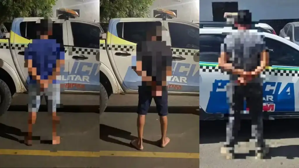 Homem preso por agredir mulher com barra de ferro: Pessoas detidas em frente a viatura policial