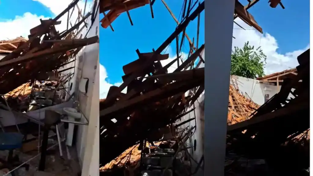Desabamento telhado restaurante popular buriti bravo: Telhado de residência desabado, estrutura de madeira e escombros
