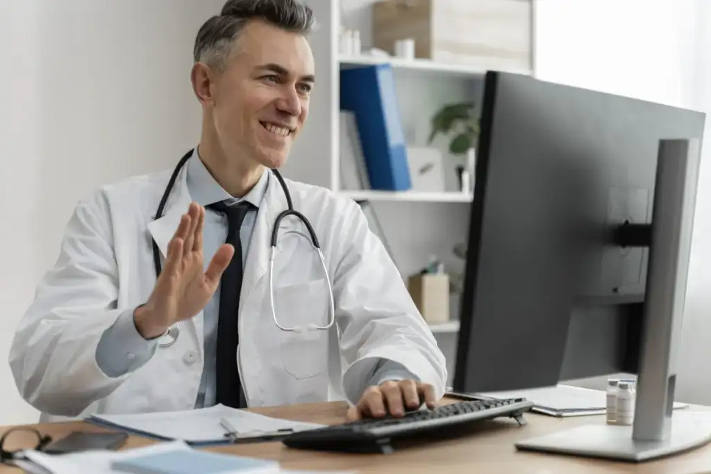 médico em sala de atendimento